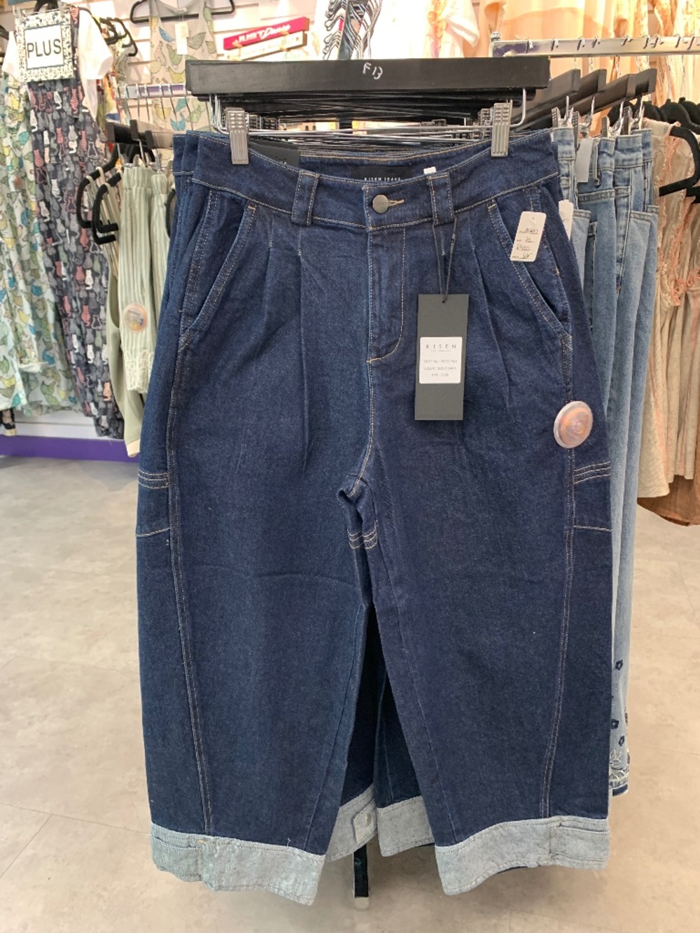 Risen dark denim pleated barrel jean with detail bottom